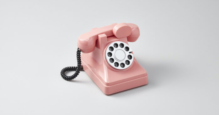 Image shows a pink telephone. The image is used to support an article about 8848's call centre service.