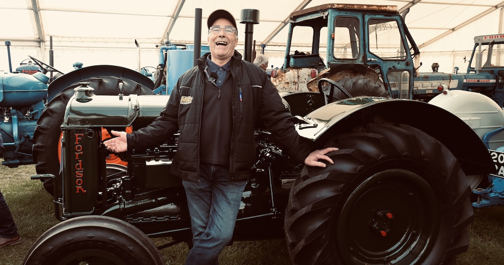 Image shows a farmer at the Goodyear Farm Tires exhibition.